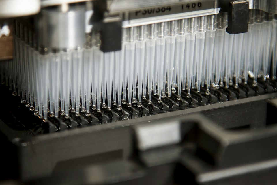 Automated liquid-handling equipment in a research laboratory