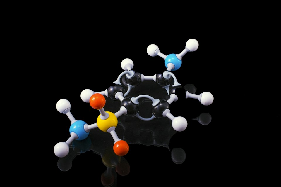 Ball-and-stick molecular model on a dark background